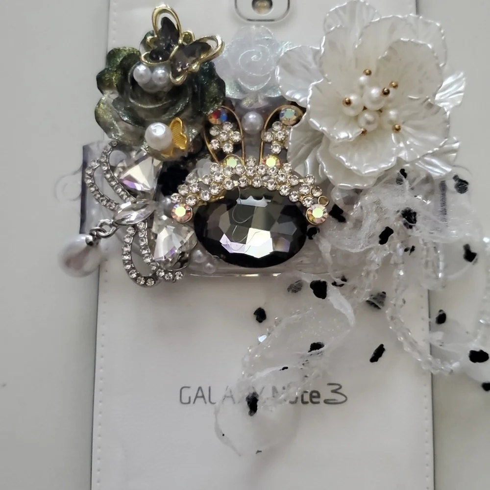 Custom-made Decorative Phone Clip with Floral and Gem Accents
